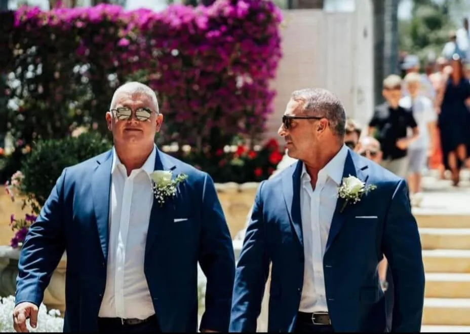 Wedding guests in bespoke blue tailored jackets